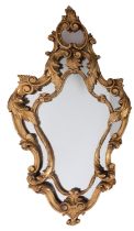 A carved and giltwood framed marginal wall mirror in 18th century taste,