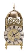 WITHDRAWN An English brass lantern mantel clock the eight-day duration,