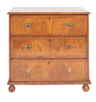 A George II walnut and crossbanded chest of drawers,