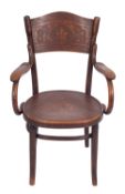 An Austro-German bentwood and embossed elbow chair in Art Nouveau style, by Thonet,