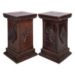 A pair of Victorian oak pedestals in Gothic taste,