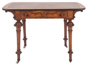 A Victorian walnut and line inlaid writing table,