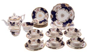 A Coalport 'Batwing' porcelain complete tea service painted and transfer printed with cartouches of