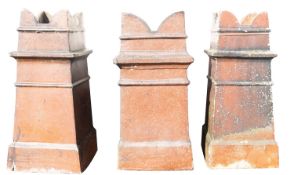 A pair of Victorian glazed stoneware chimney pots,
