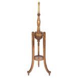 A carved and giltwood standard lamp in 18th century taste,