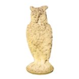 A reconstituted stone garden model of an owl,