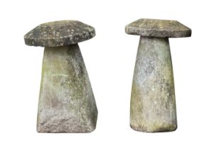 A pair of limestone staddles with caps,
