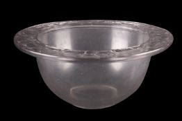 A Lalique bowl Cernuschi, of deep circular form the rim moulded in relief with flowers, wheel cut R.