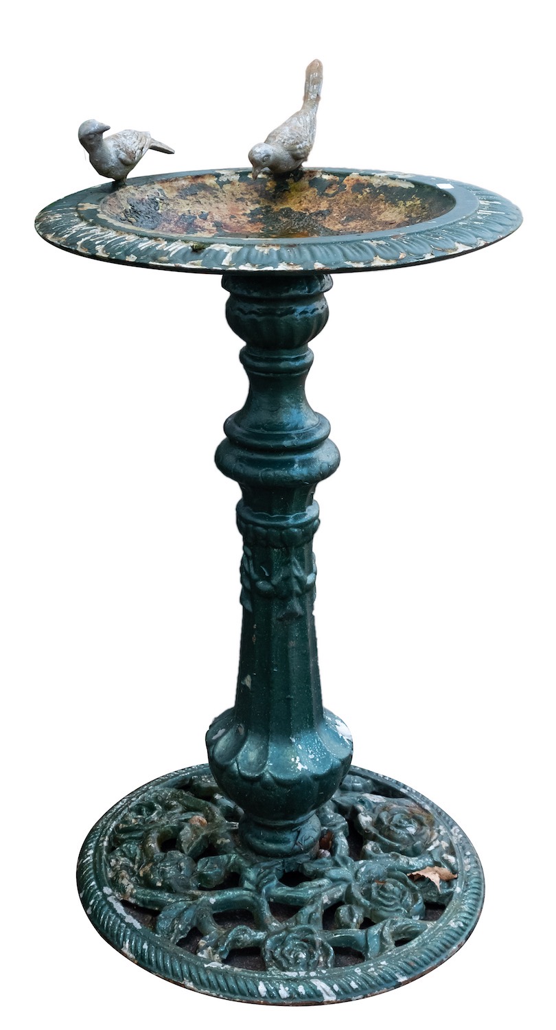 A painted cast iron bird bath,