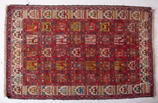 A Soumak park silk Kilim, the rose compartmented field with stylised birds and geometric designs,