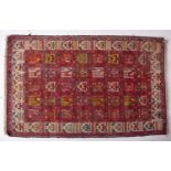 A Soumak park silk Kilim, the rose compartmented field with stylised birds and geometric designs,