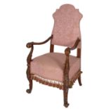 A mahogany and upholstered elbow chair in early 18th century Continental taste,