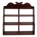 A Regency simulated rosewood hanging waterfall bookcase,
