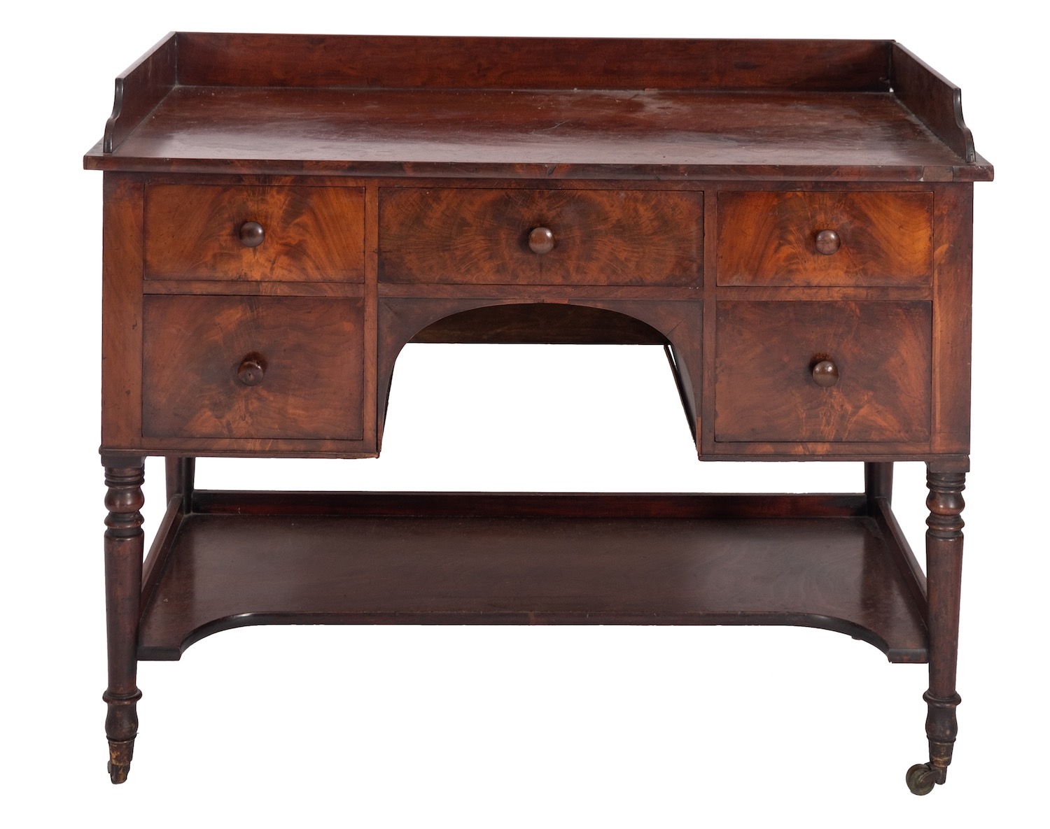 A Regency mahogany dressing table, by Wilkinson & Sons,