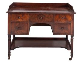 A Regency mahogany dressing table, by Wilkinson & Sons,
