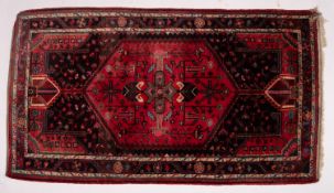 A Turkish carpet, the ivory stepped and