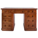 A mahogany pedestal desk in Regency styl