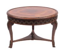 A walnut, kingwood and gilt metal mounted low table in Louis XVI taste,