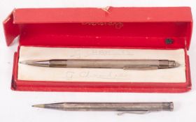 A silver Eversharp propelling pencil, wi