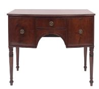 A Regency mahogany and crossbanded bowfront sideboard,