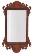 A yew wood framed wall mirror in George