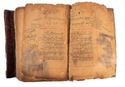 QURAN, Arabic manuscript on paper, possibly from Yemen, possibly 19th century, red ruled throughout,