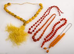 Fakturan type worry beads, two others im