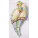 A Clarice Cliff wall pocket Budgerigars