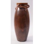 A Wesuma orange uranium glazed vase, of