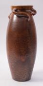 A Wesuma orange uranium glazed vase, of