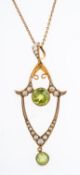 An Edwardian peridot and seed pearl pend