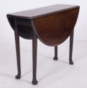 A George II mahogany drop-leaf oval tabl