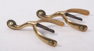 A pair of George III brass and steel spu
