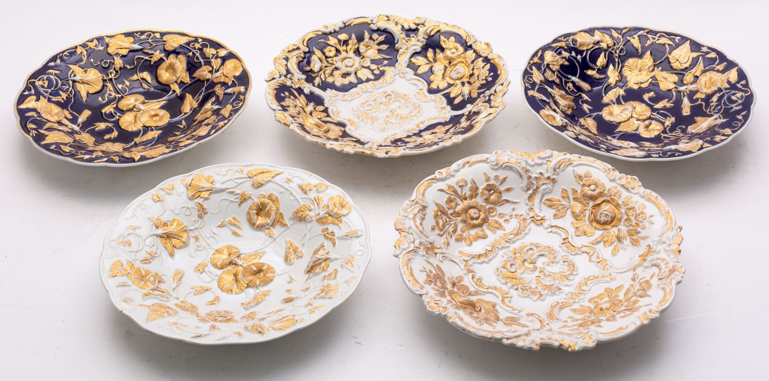 A group of five Meissen plates.
