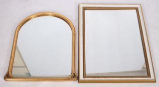 Two modern wall mirrors; the rectangular