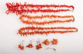 Three coral branch necklaces together wi