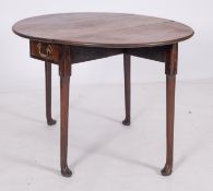 A George II mahogany oval drop-leaf tabl