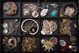 A group of white metal jewellery, includ