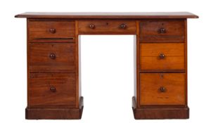 A Victorian mahogany pedestal desk, fitt