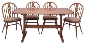 A stained elm dining table and four chai