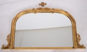 A giltwood and composition framed arched