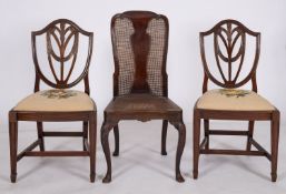 A pair of mahogany side chairs in George