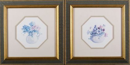 Two coloured prints of flowers in vases,