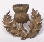 A gilt brass Scottish officer's cap badg