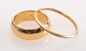 Two gold wedding bands,