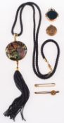 A group of jewellery to include a gold bar brooch with small diamond, an enamelled pendant,