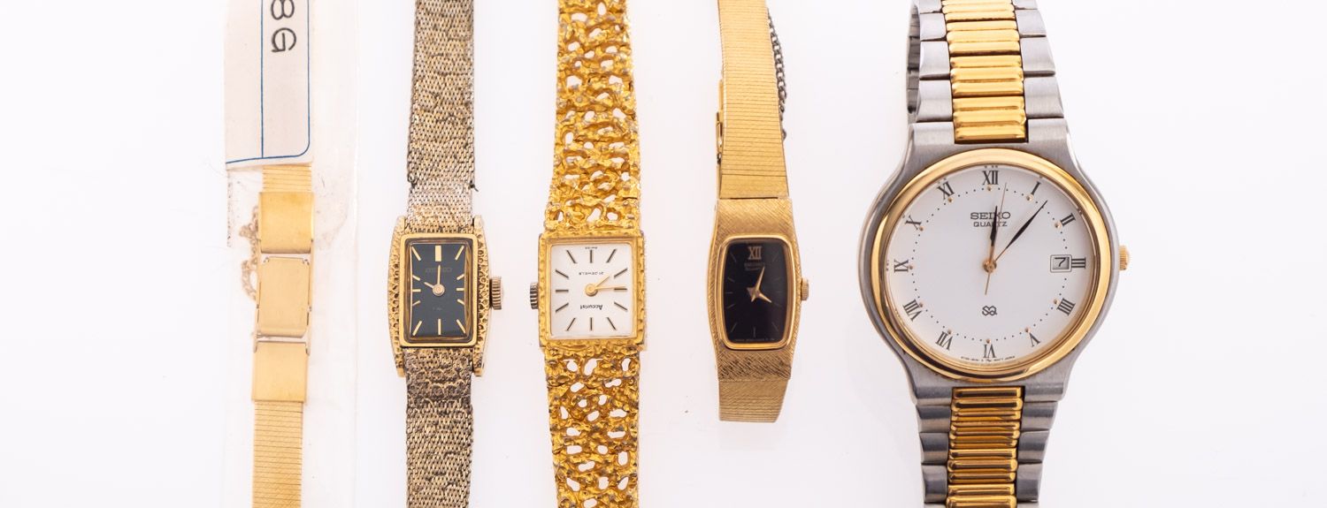 Four quartz watches including Seiko Quartz number 953426, diameter 36mm in box,