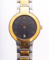 Gucci a lady's stainless steel and gold-plated wristwatch the grey dial with baton and Arabic