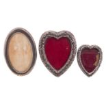 A small silver heart shaped photograph frame by B &S Ltd, Birmingham 1901,