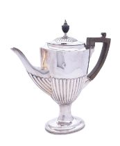 An Edward VII silver tea pot by William Hutton & Son Ltd, London 1902, of vase shape,